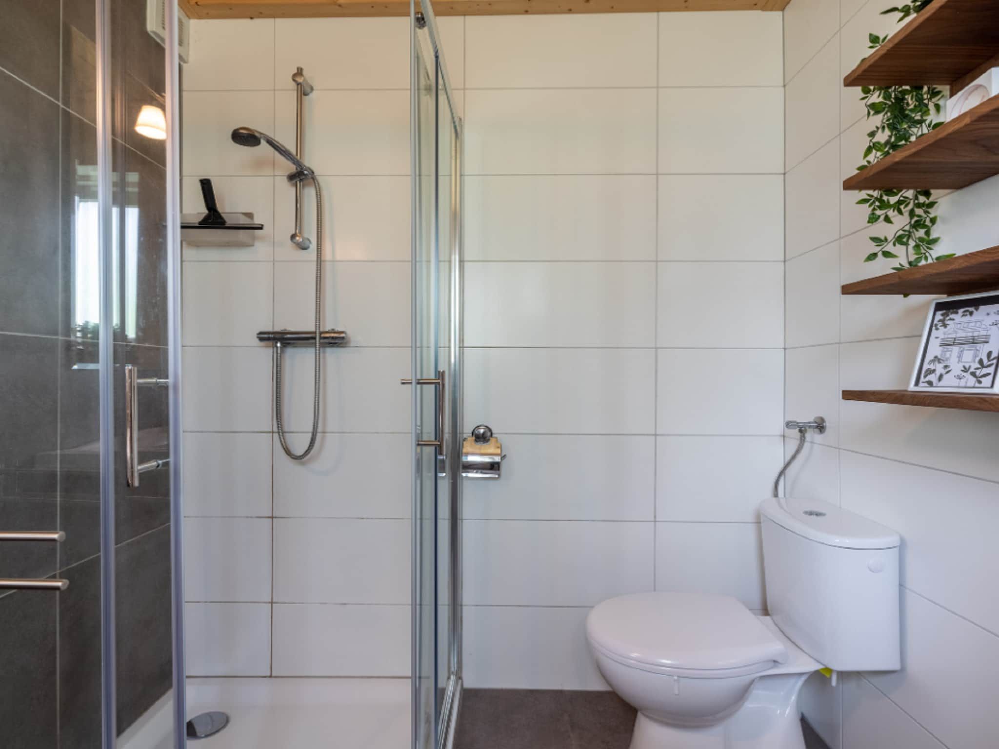 De badkamer van Vakantiepark De Rimboe & De Woeste Hoogte 18 in Hoenderloo