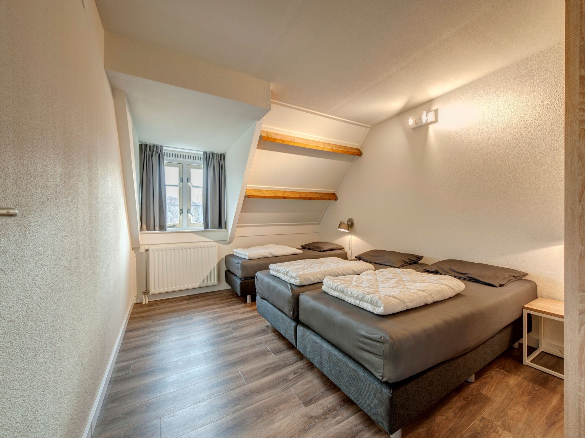 Een slaapkamer van Buitenhof Domburg  14 in Domburg