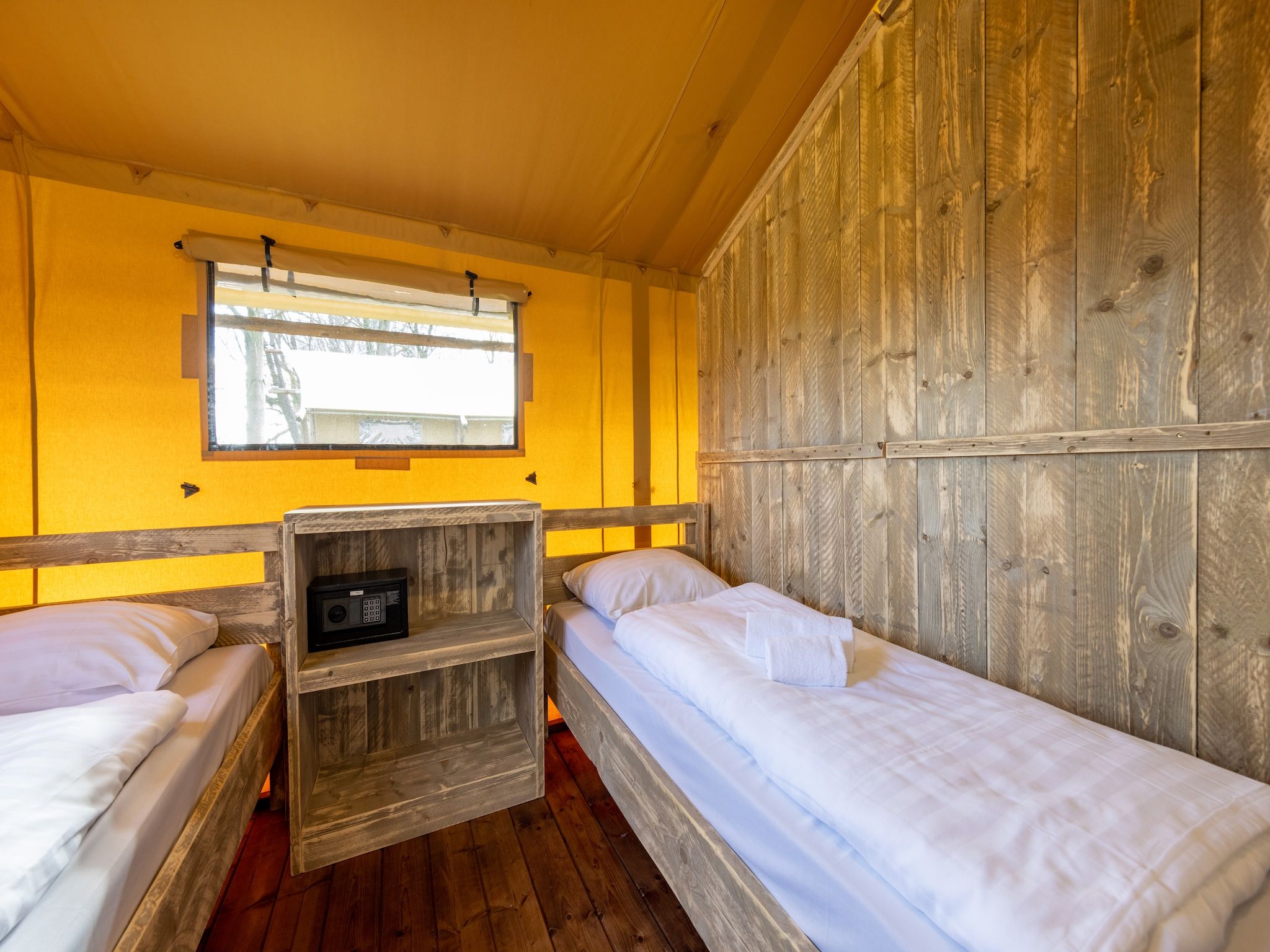 Een slaapkamer van Hunzepark 15 in Gasselternijveen