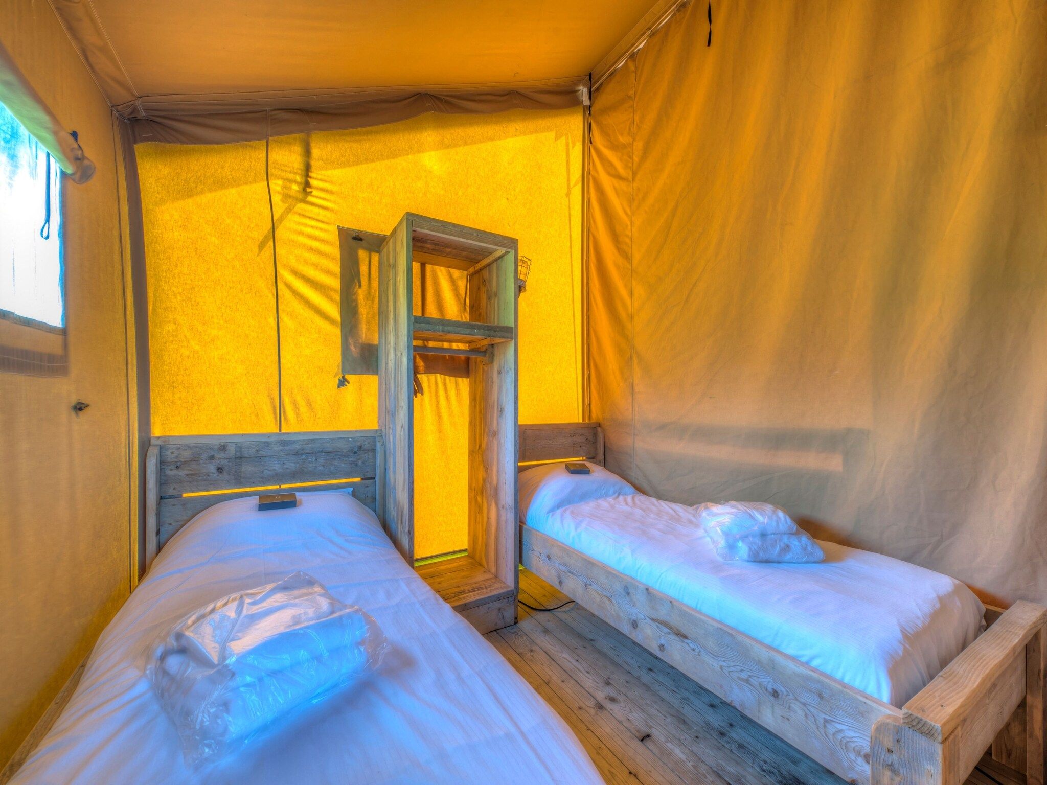 Een slaapkamer van Vakantiepark Hunzedal 15 in Borger