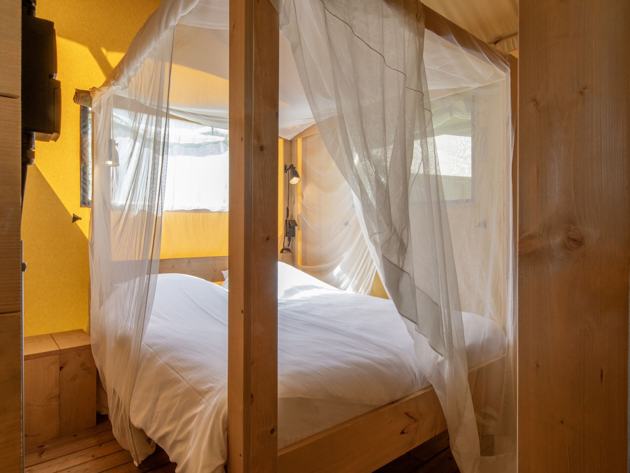 Een slaapkamer van Vakantiepark Klein Vink 19 in Arcen