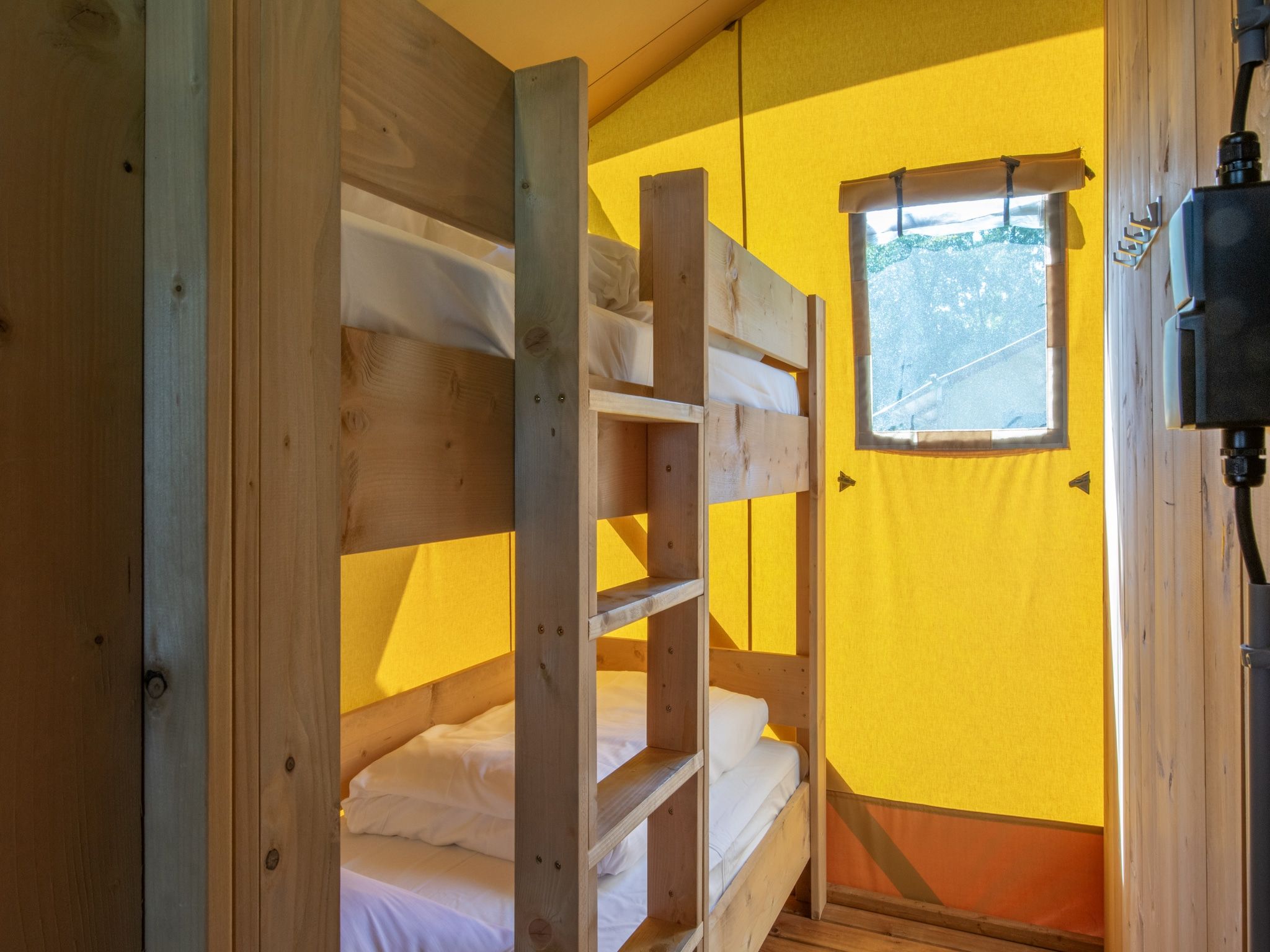 Een slaapkamer van Vakantiepark Klein Vink 19 in Arcen