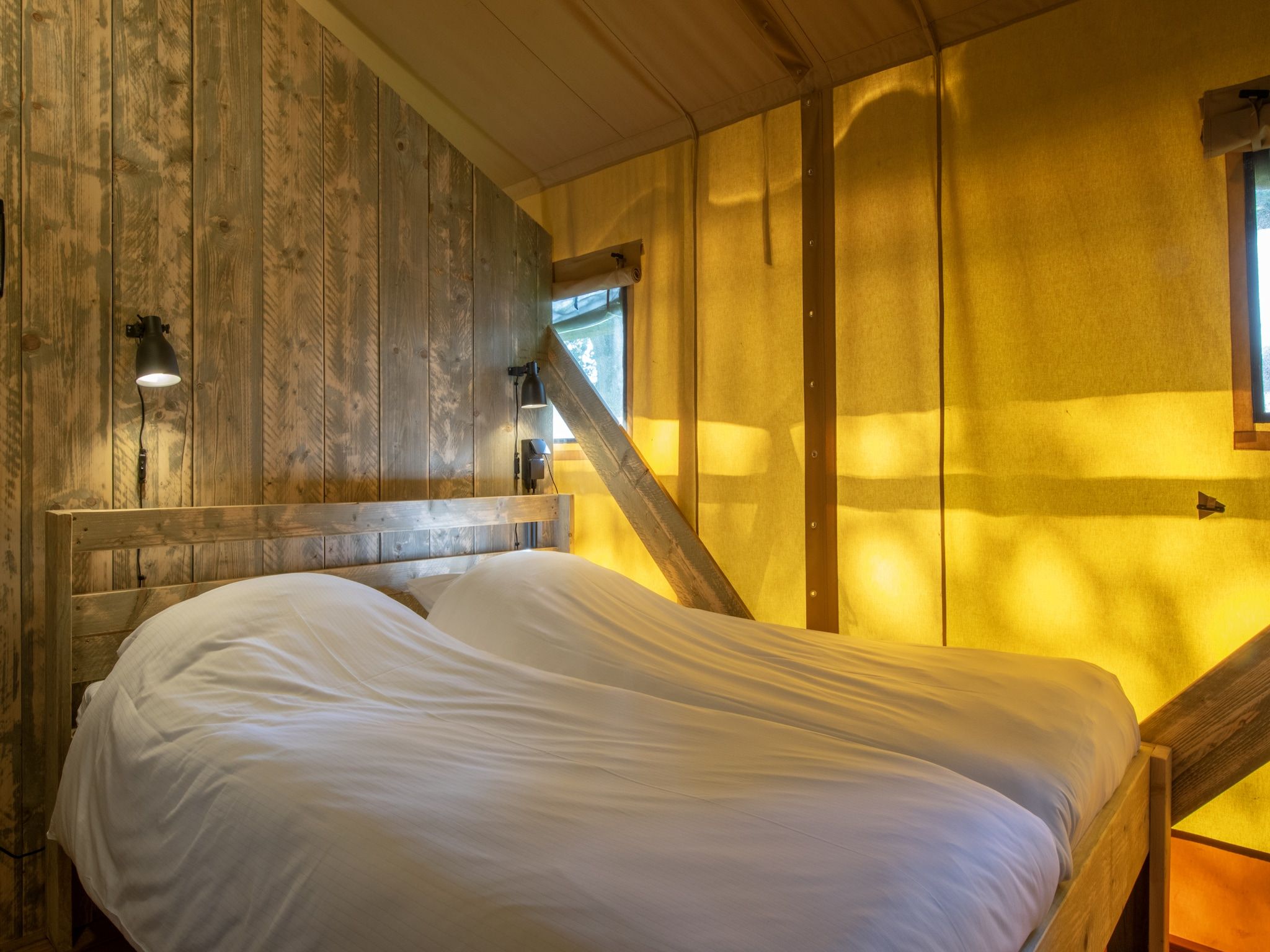 Een slaapkamer van Vakantiepark Klein Vink 20 in Arcen