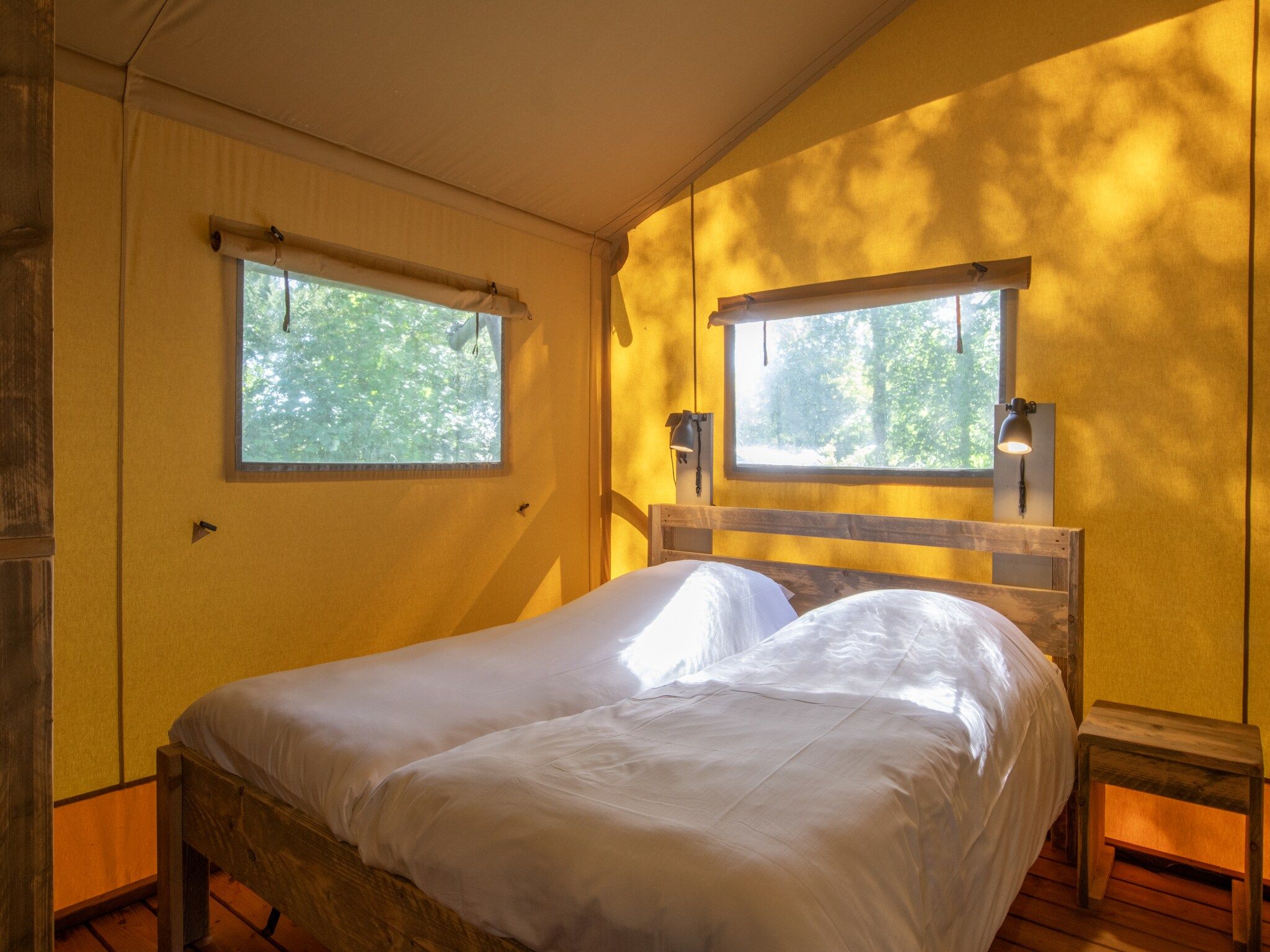 Een slaapkamer van Vakantiepark Klein Vink 21 in Arcen