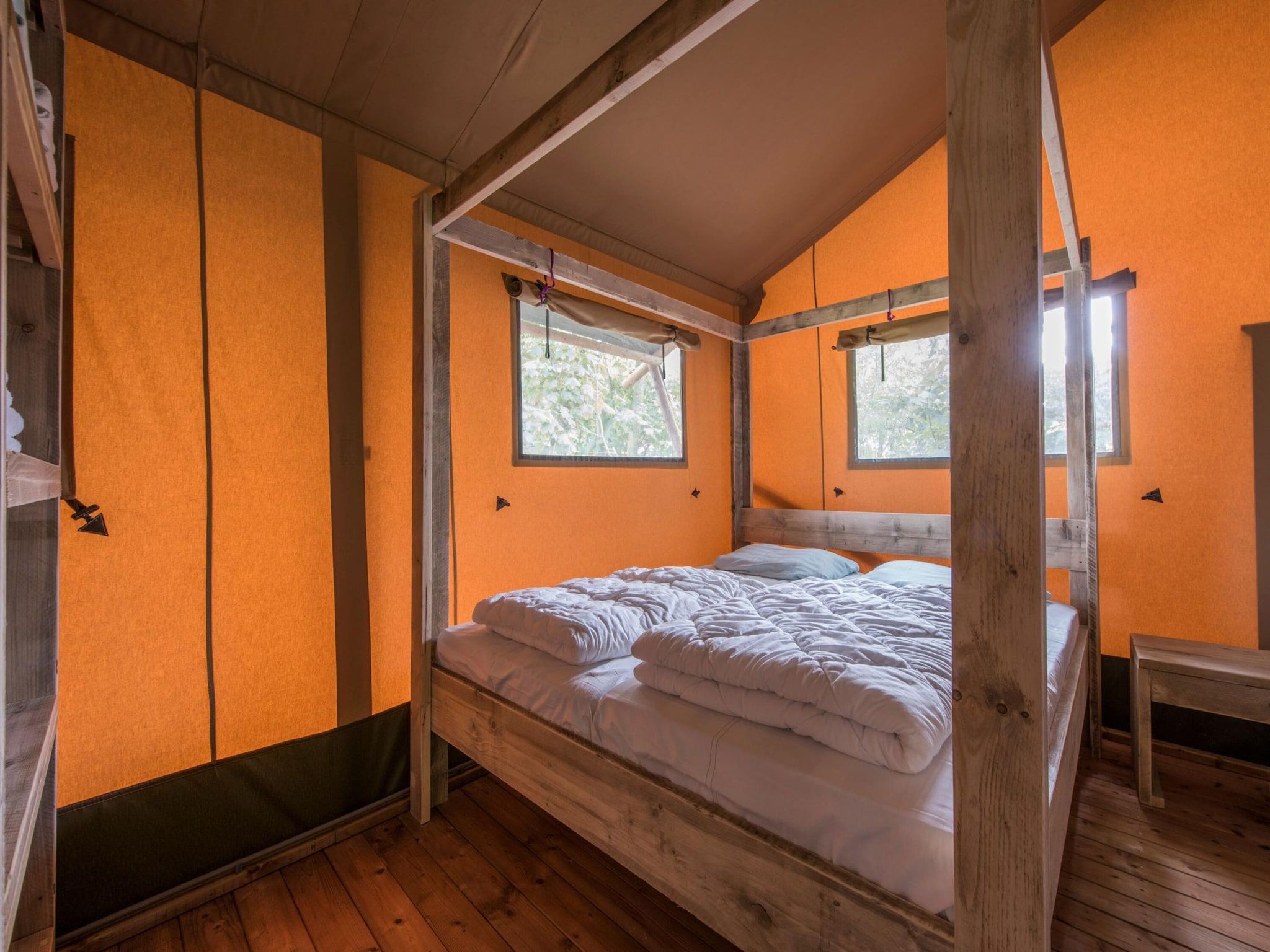 Een slaapkamer van Bospark 't Wolfsven 13 in Mierlo