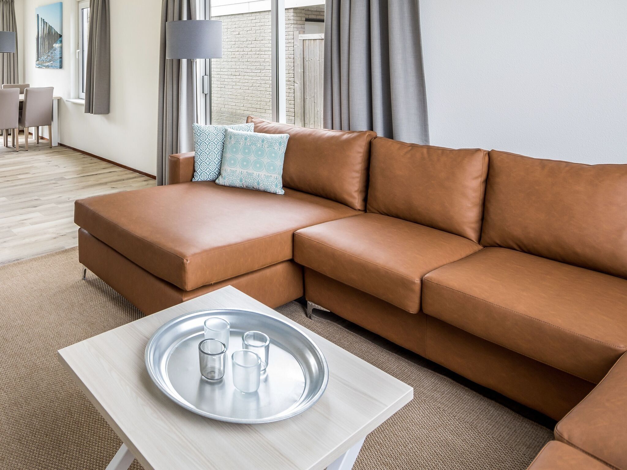 De woonkamer van Vakantiepark Zeeland Village 1 in Scharendijke