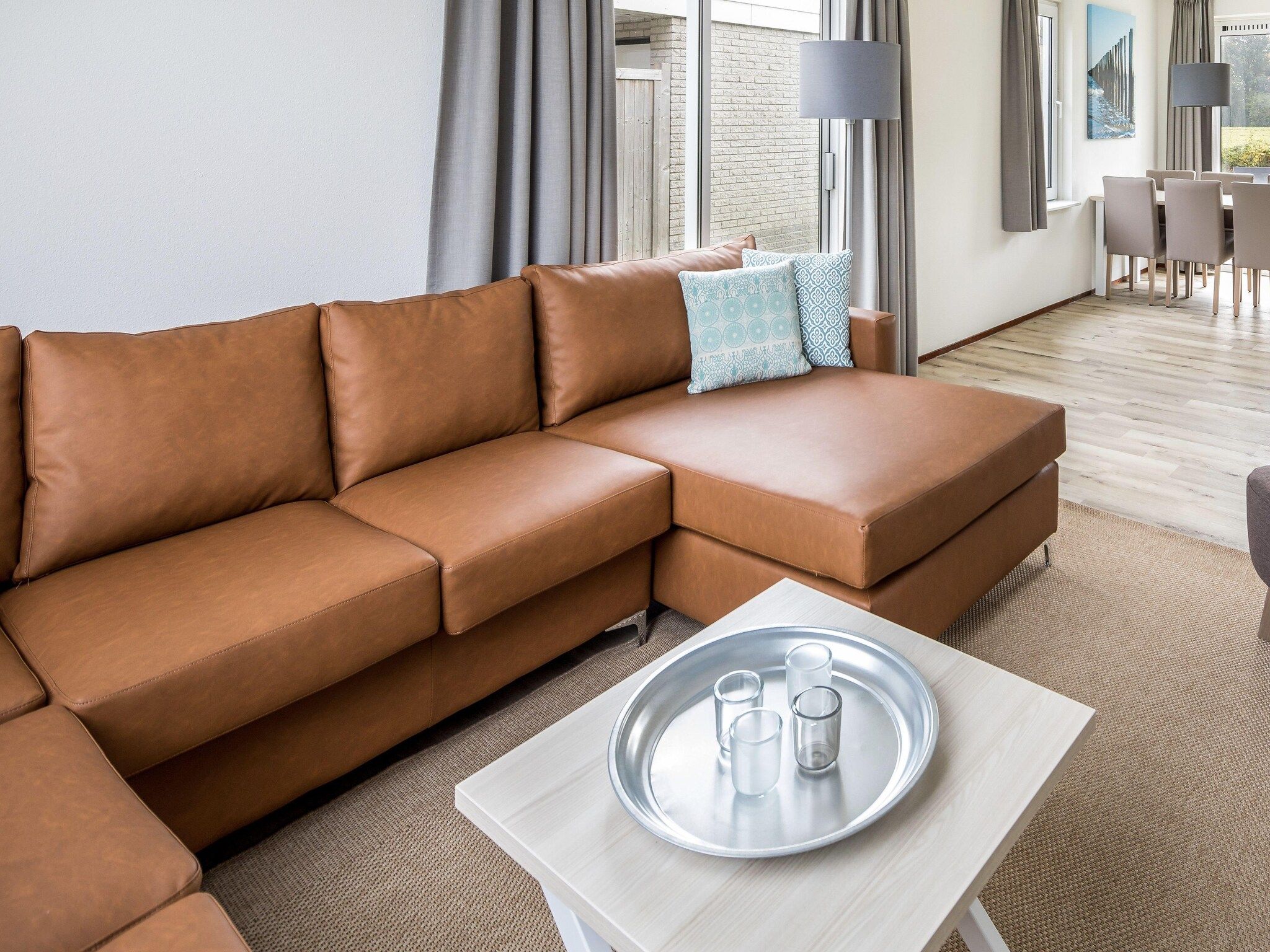 De woonkamer van Vakantiepark Zeeland Village 2 in Scharendijke