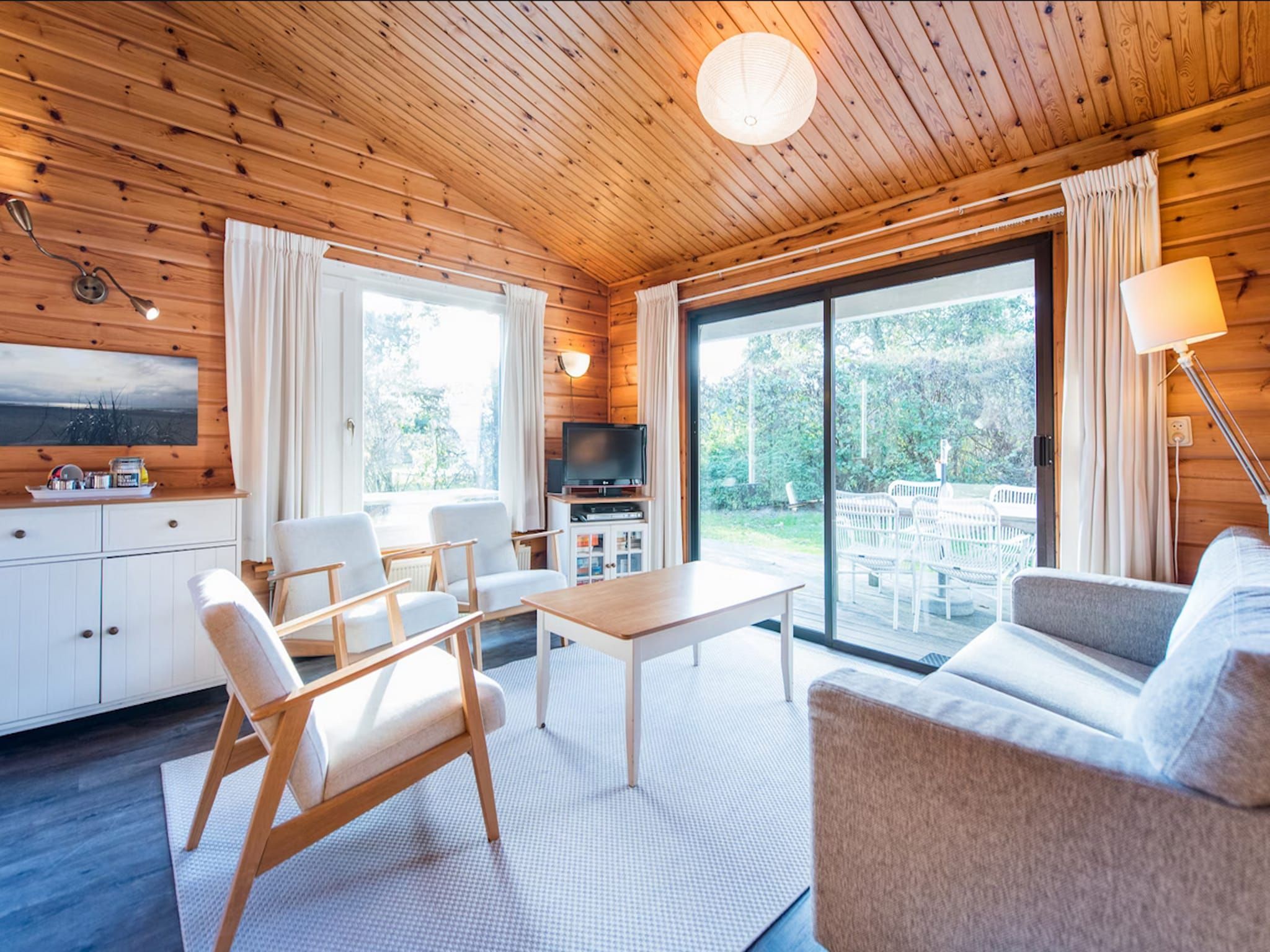 De woonkamer van Vakantiepark Boomhiemke 16 in Hollum