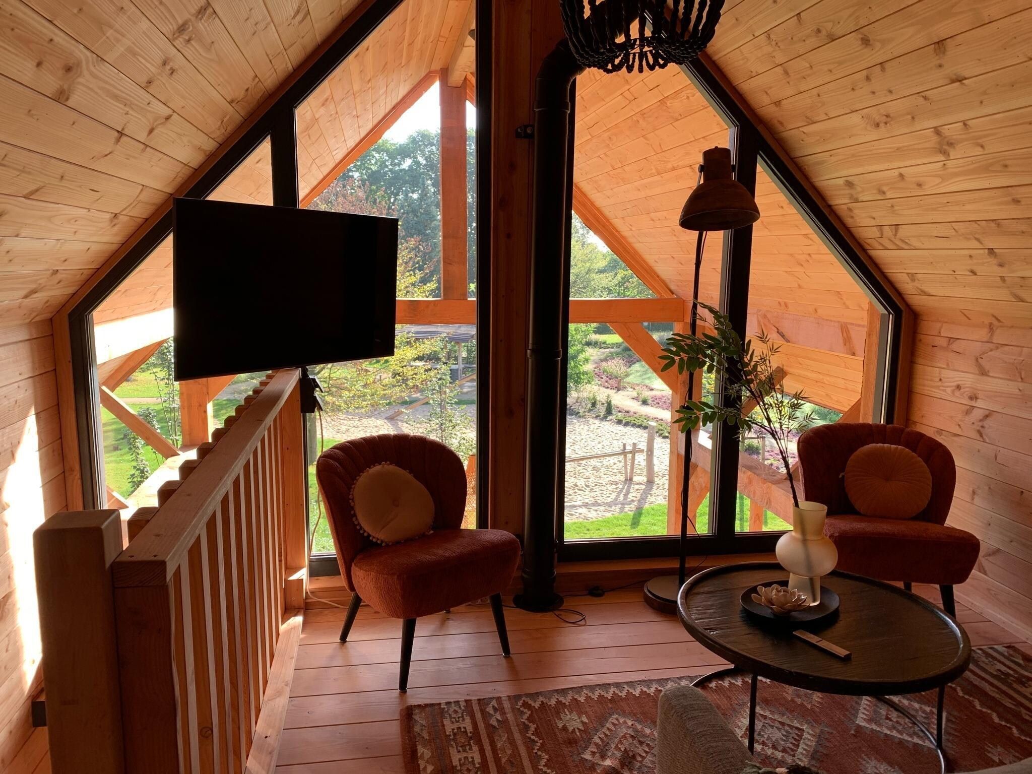 De woonkamer van Vakantiepark Sandberghe 12 in Uden