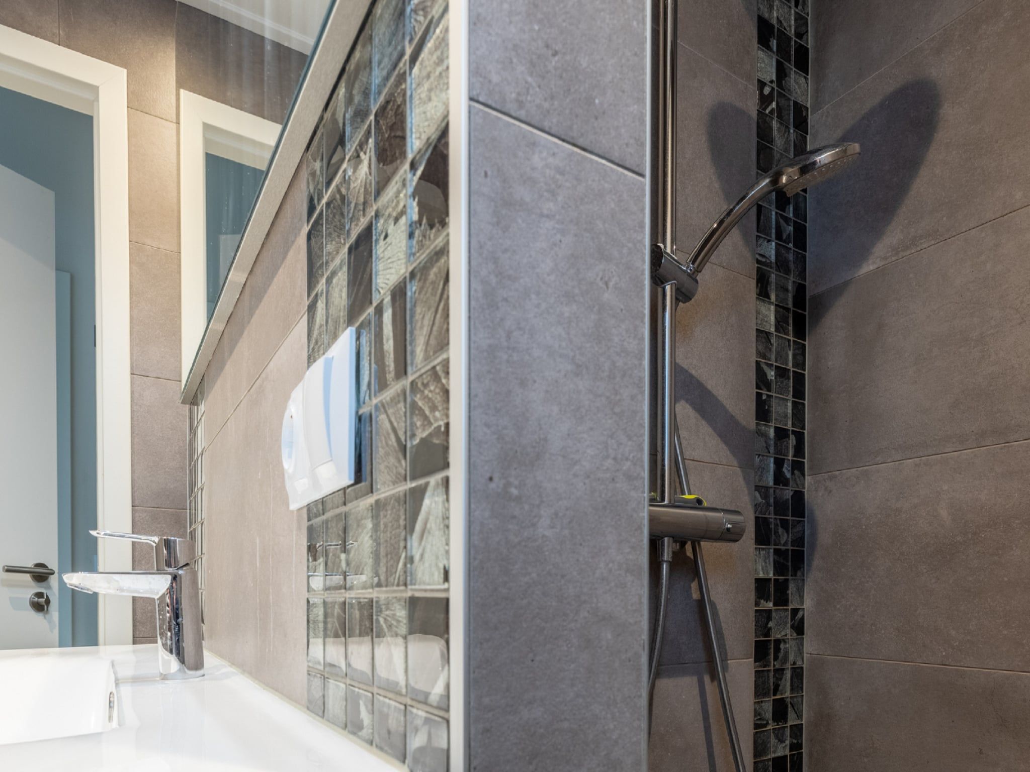 De badkamer van Vakantiepark De Rimboe & De Woeste Hoogte 20 in Hoenderloo