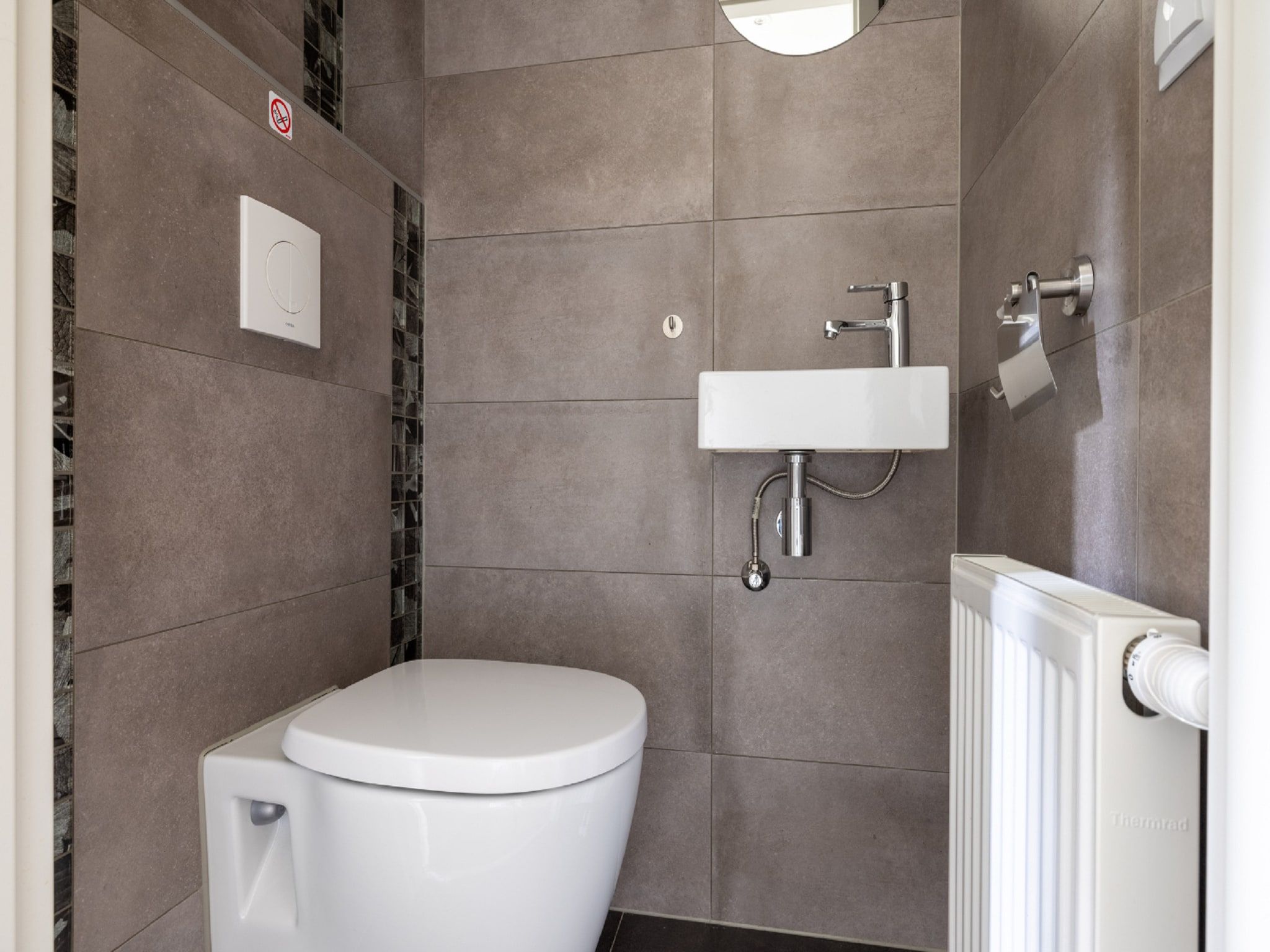 De badkamer van Vakantiepark De Rimboe & De Woeste Hoogte 20 in Hoenderloo