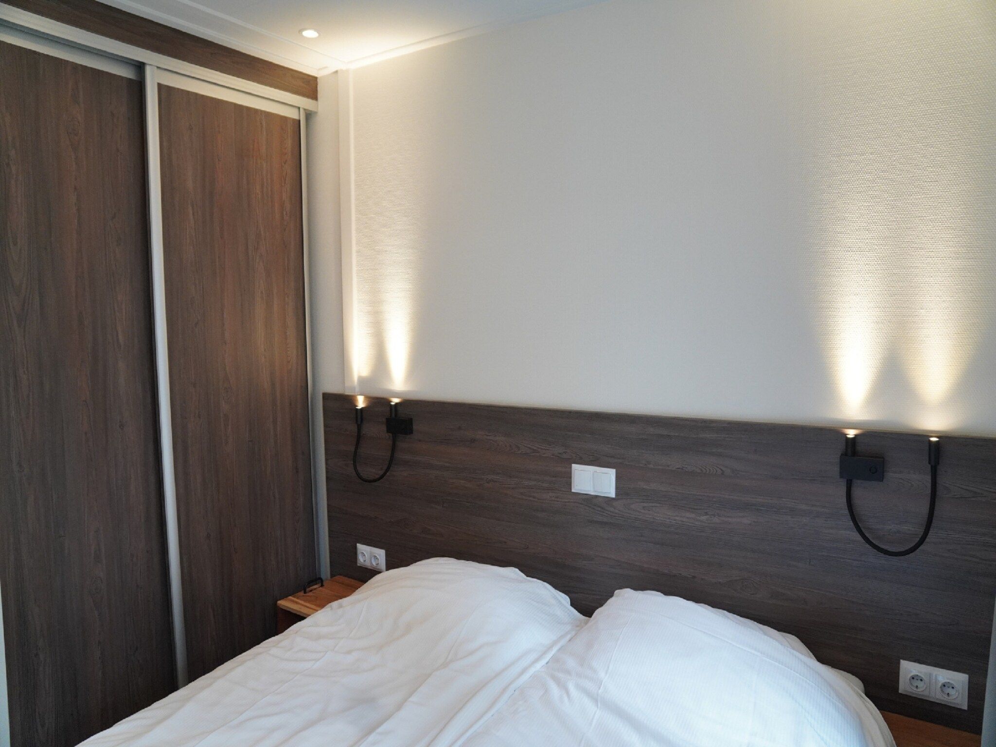 Een slaapkamer van Vakantiepark De Rimboe & De Woeste Hoogte 20 in Hoenderloo