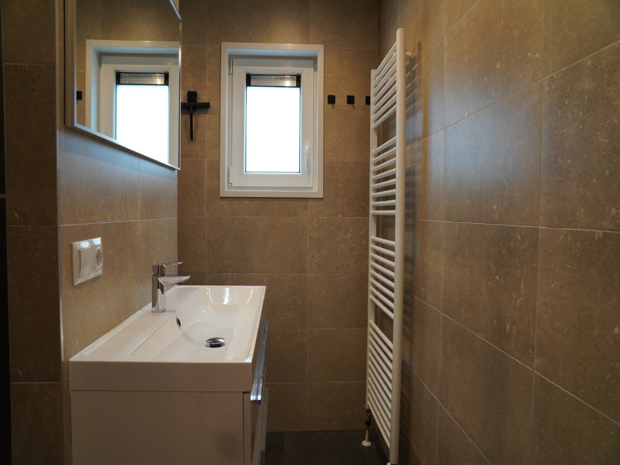 De badkamer van Vakantiepark De Rimboe & De Woeste Hoogte 20 in Hoenderloo