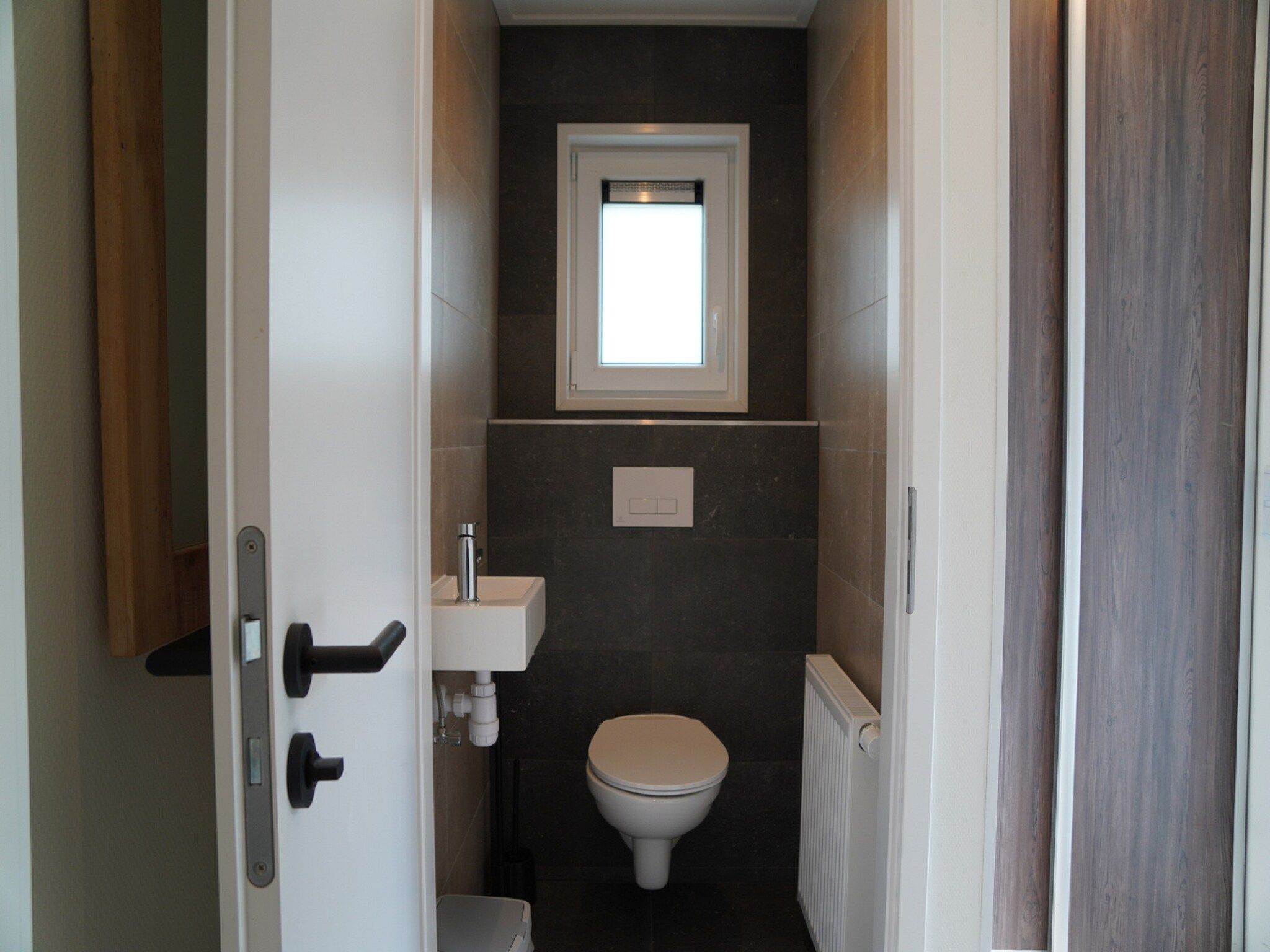 De badkamer van Vakantiepark De Rimboe & De Woeste Hoogte 20 in Hoenderloo