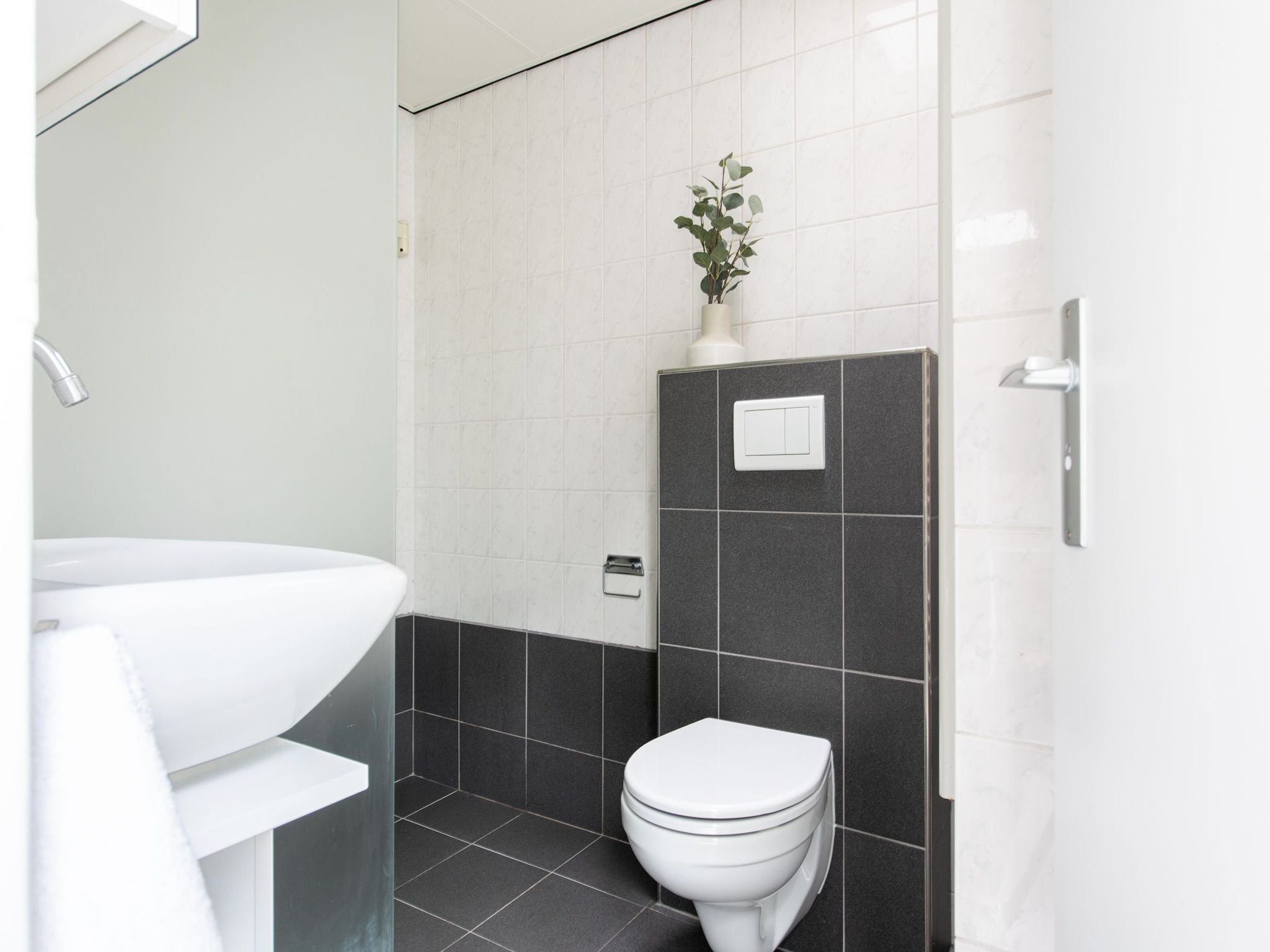 De badkamer van Vakantiepark de Berkenhorst 10 in Kootwijk