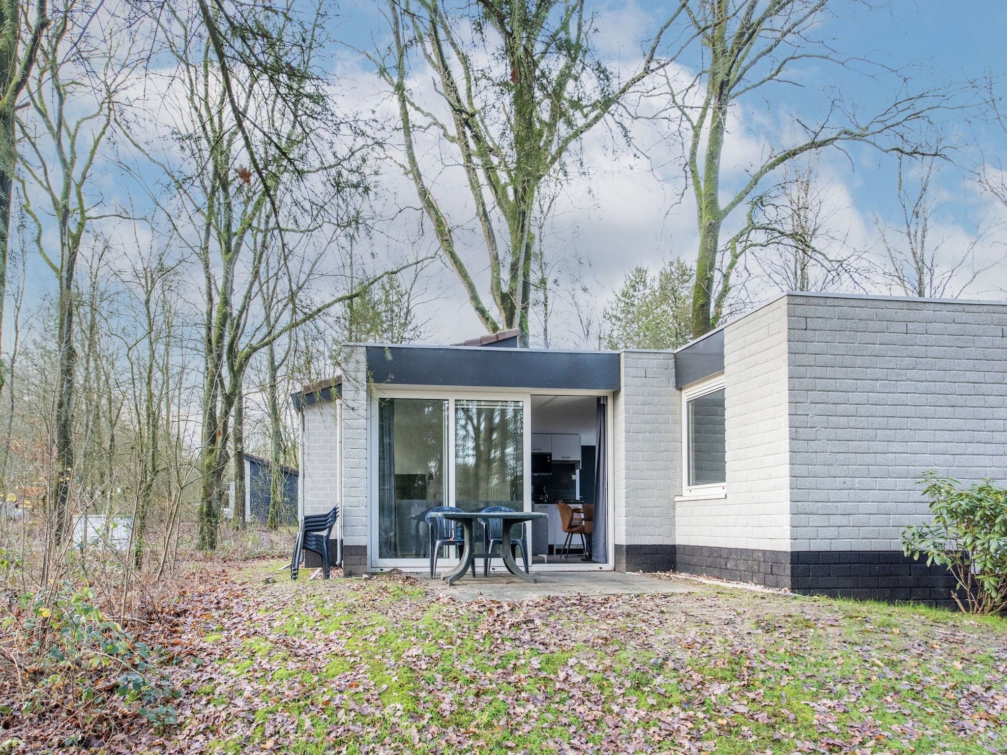 De buitenkant van Vakantiepark de Berkenhorst 11 in Kootwijk