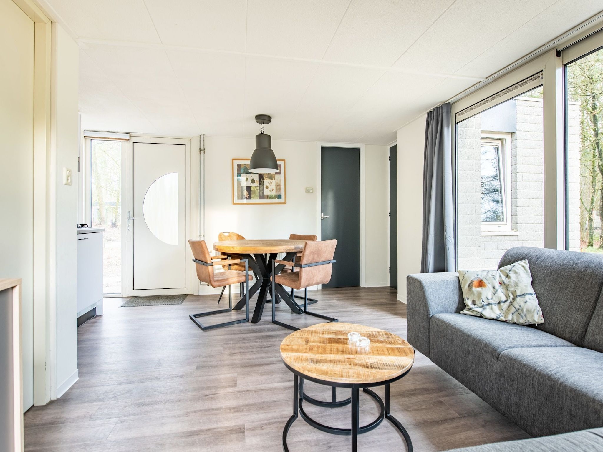 De woonkamer van Vakantiepark de Berkenhorst 11 in Kootwijk