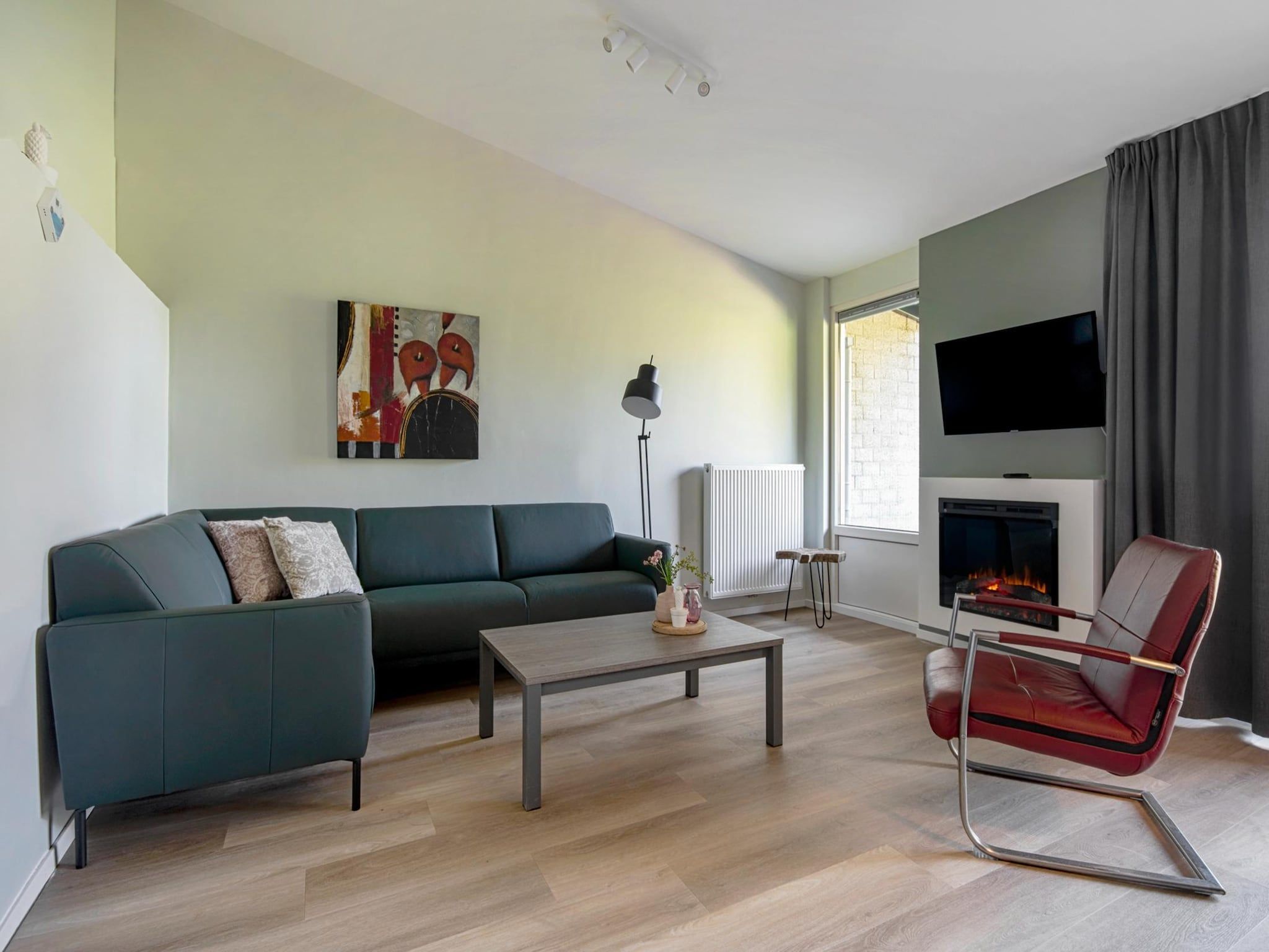 De woonkamer van Bungalowpark Schin op Geul 15 in Walem