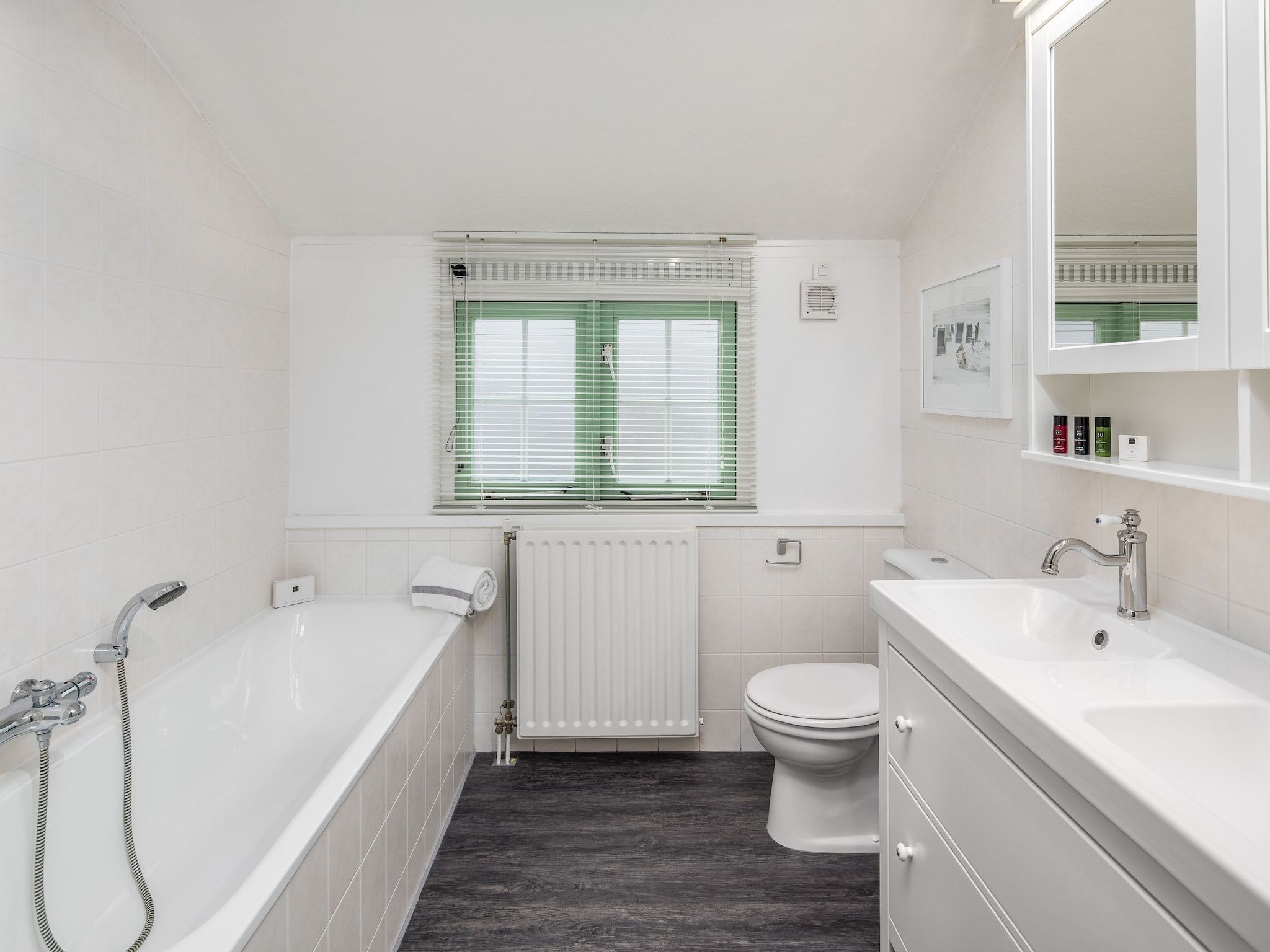 De badkamer van Noordzee Résidence De Banjaard 19 in Kamperland