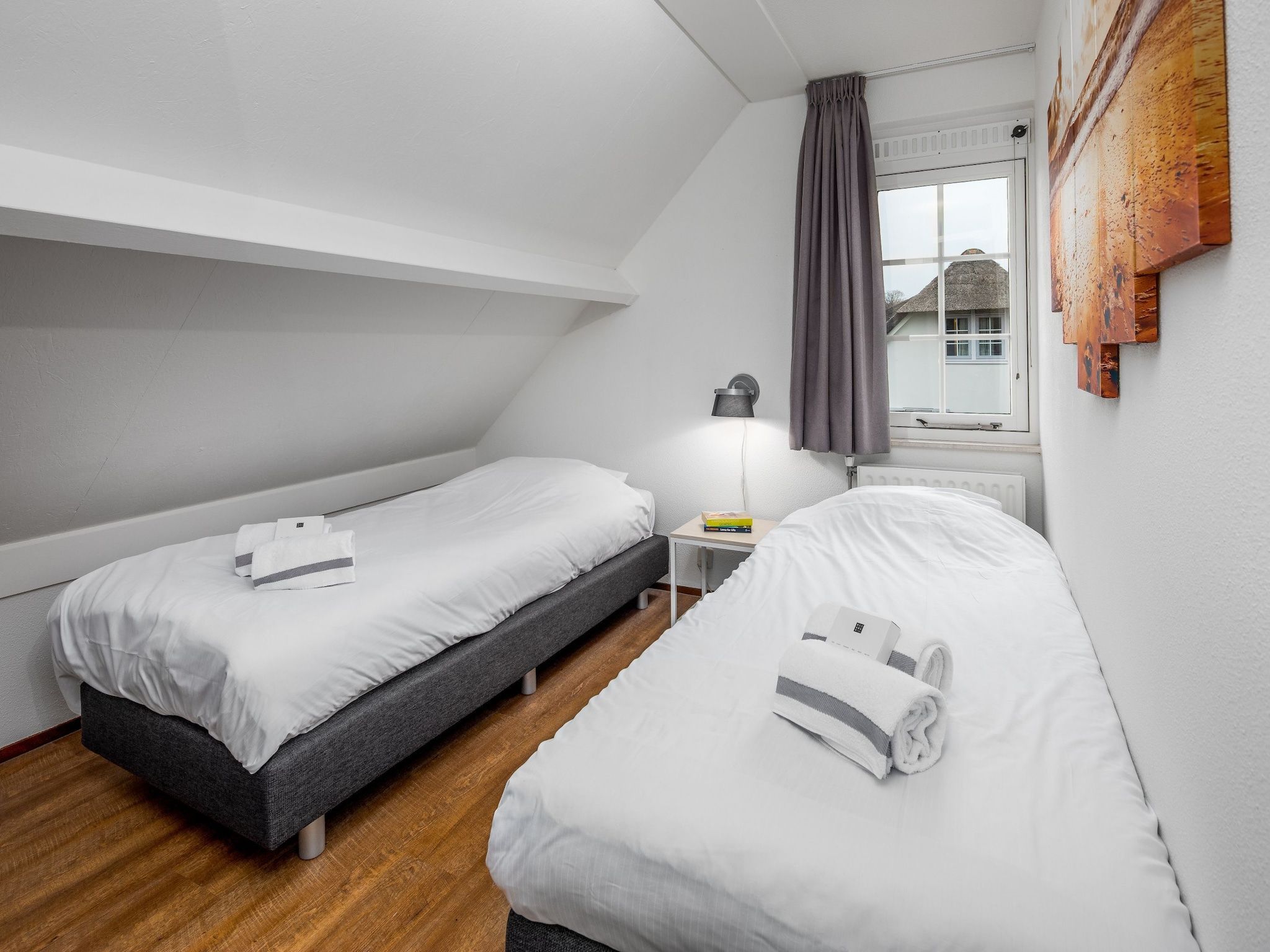 Een slaapkamer van Noordzee Résidence De Banjaard 19 in Kamperland