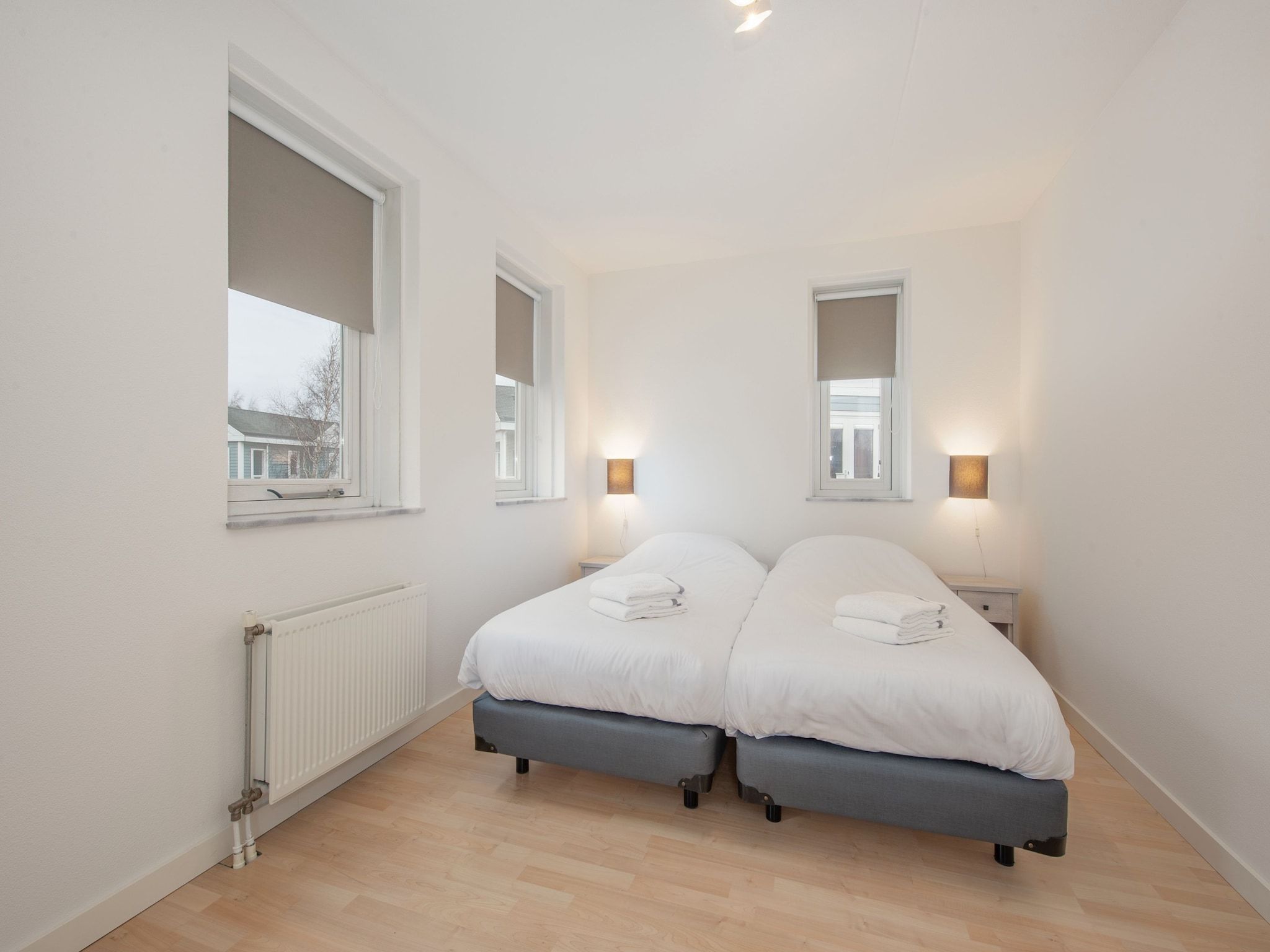 Een slaapkamer van Cape Helius 21 in Hellevoetsluis