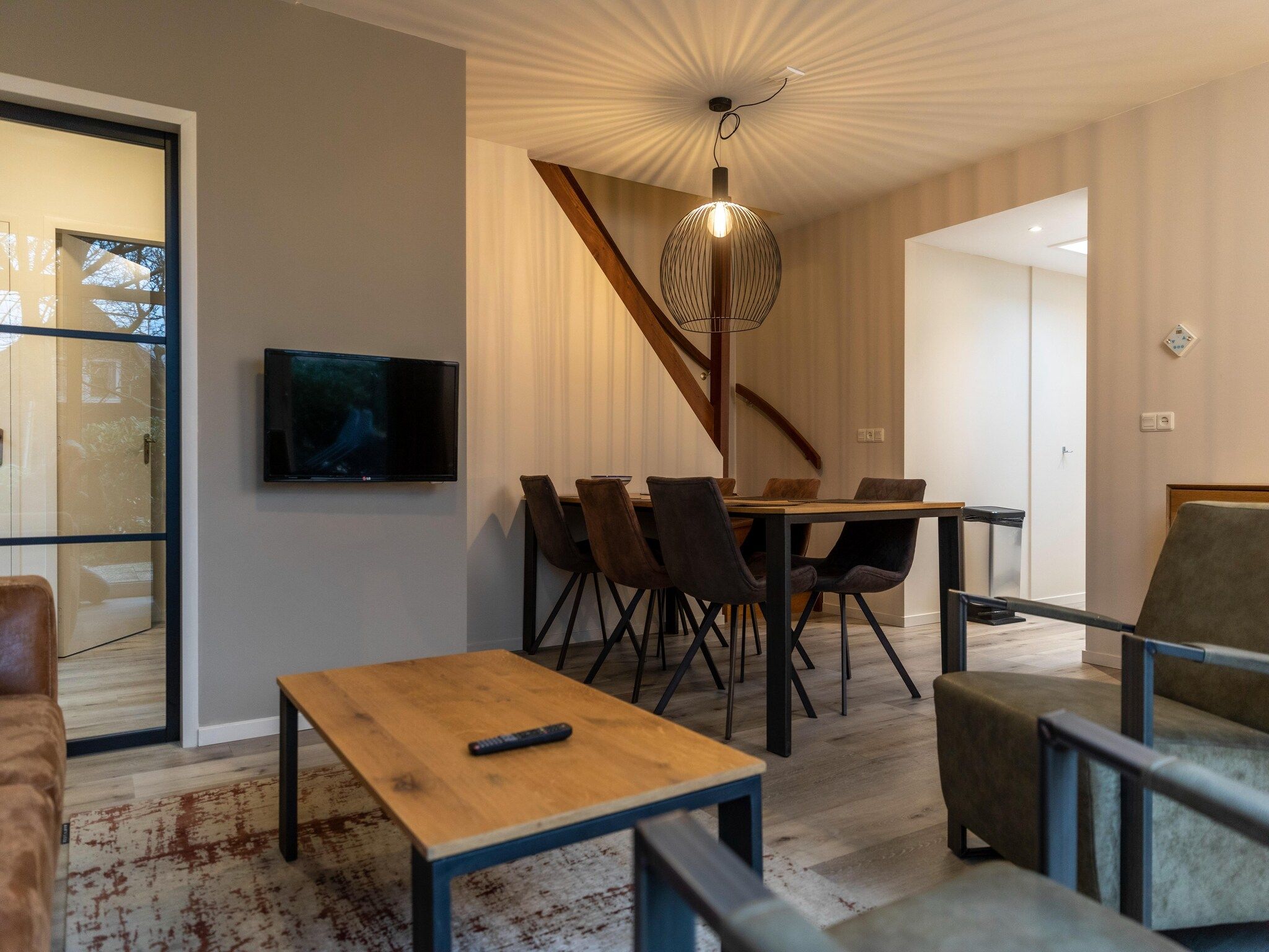 De woonkamer van Vakantie bij Meeussen - Schuttersoord 2 in Mook