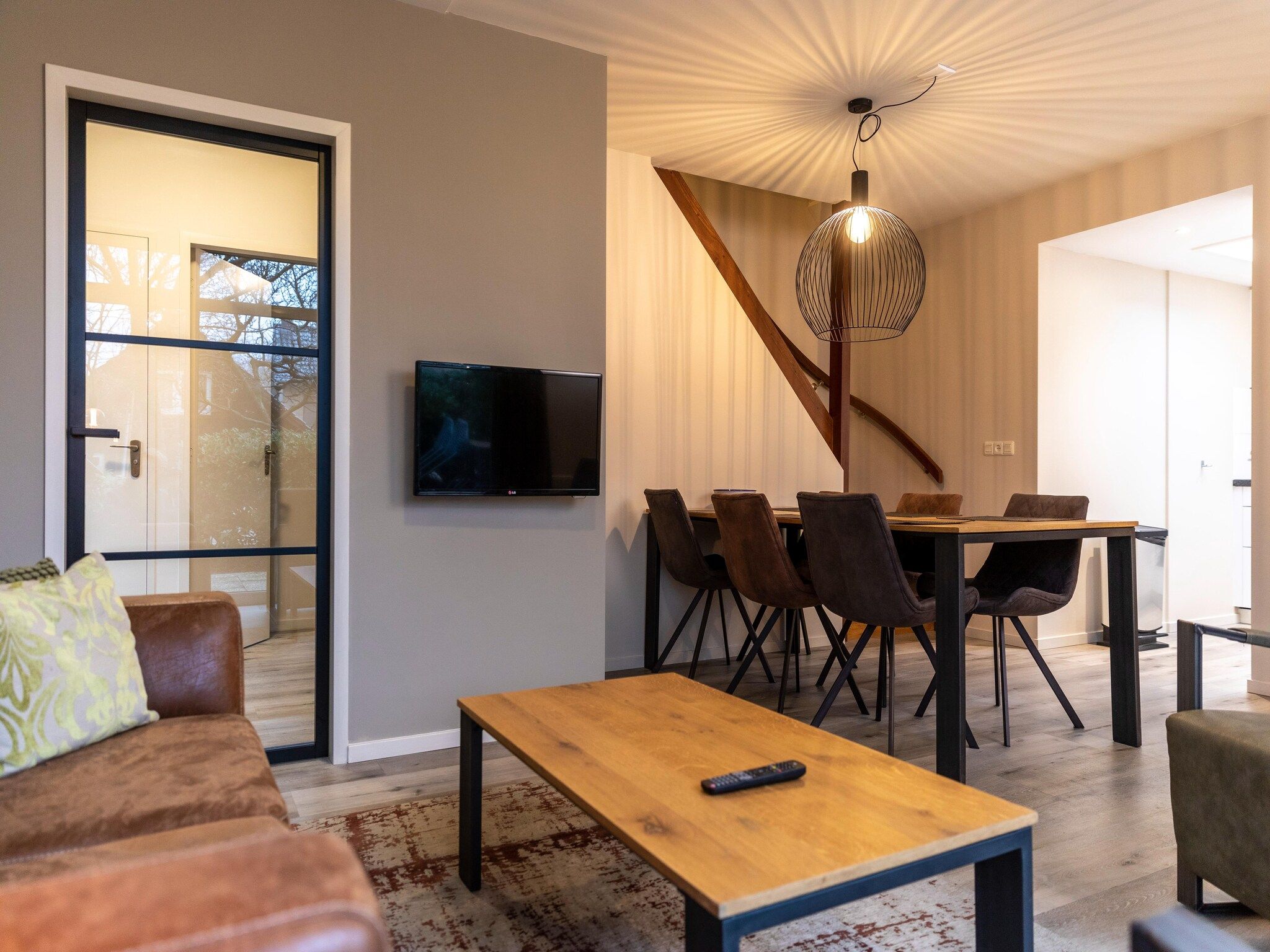 De woonkamer van Vakantie bij Meeussen - Schuttersoord 2 in Mook