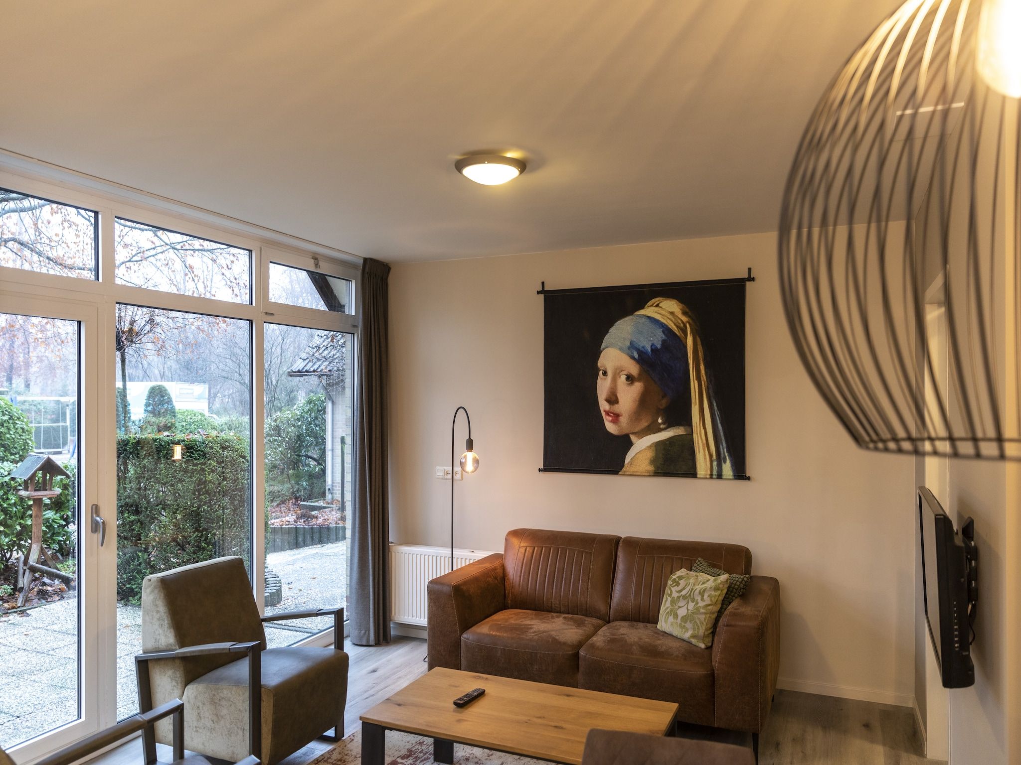 De woonkamer van Vakantie bij Meeussen - Schuttersoord 2 in Mook