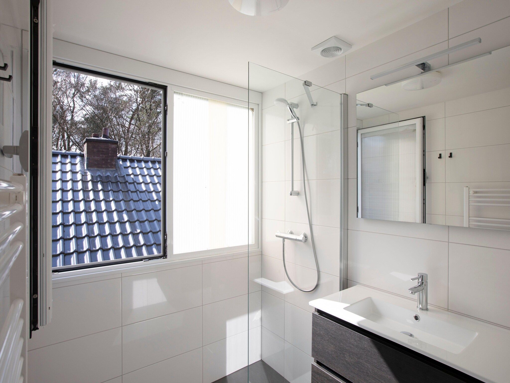 De badkamer van Vakantie bij Meeussen - Schuttersoord 2 in Mook