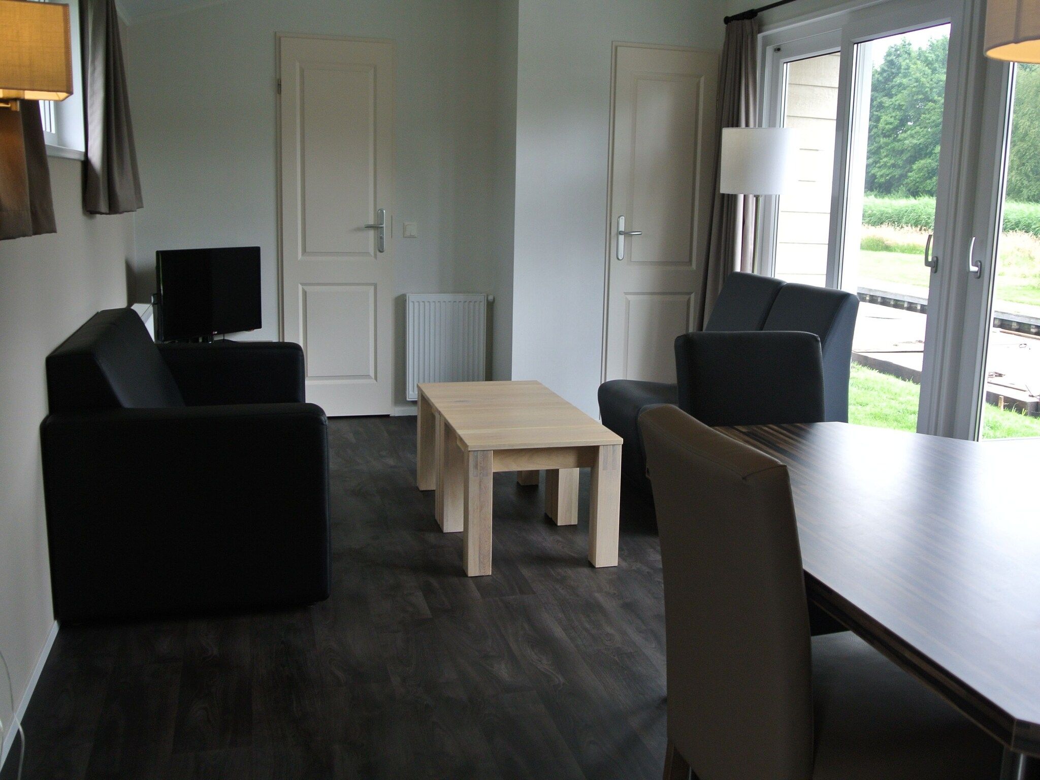 De woonkamer van Vakantiepark Giethoorn 7 in Giethoorn