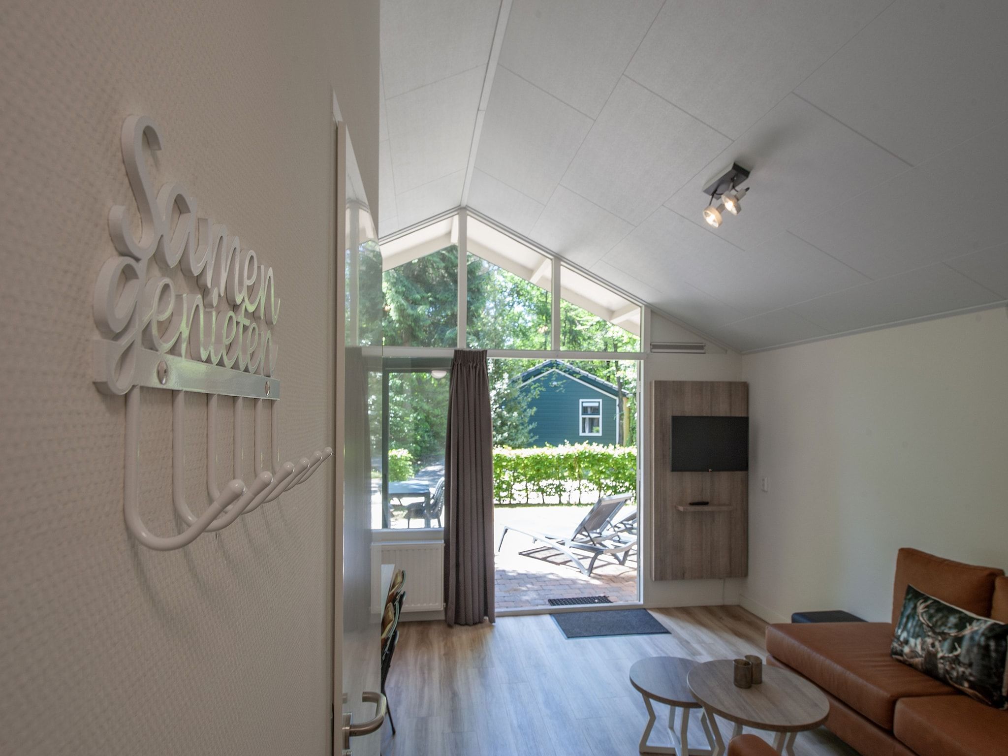 De woonkamer van Bospark de Schaapskooi 9 in Wissel/Epe