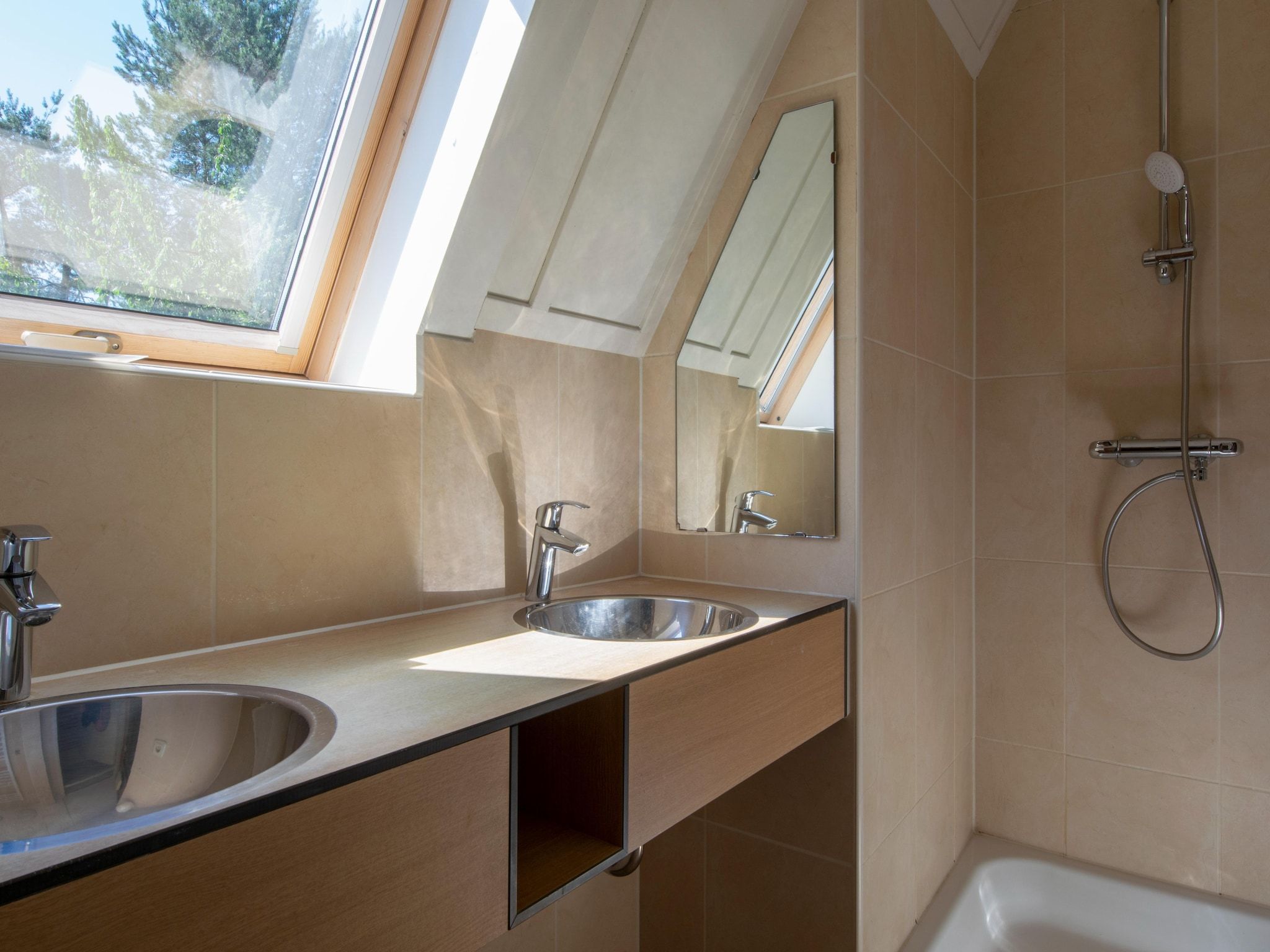 De badkamer van Vakantiepark de Katjeskelder 18 in Oosterhout