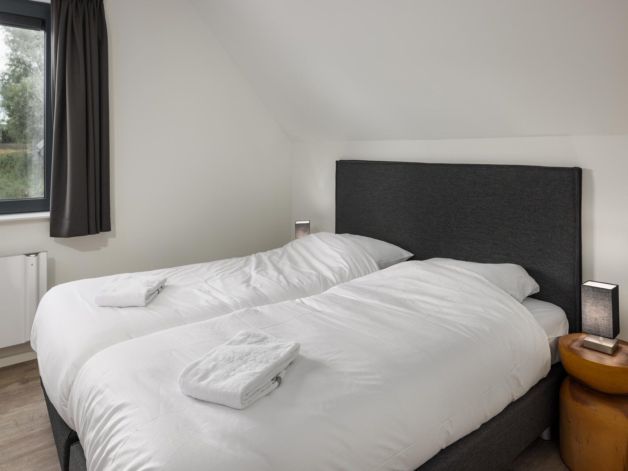 Een slaapkamer van Park Veerse Kreek 6 in Wolphaartsdijk