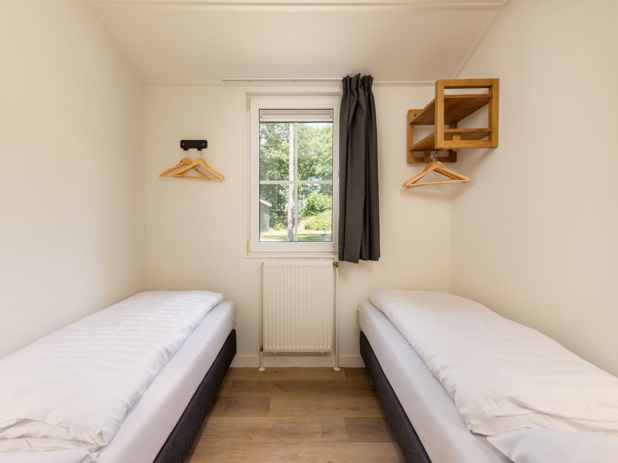 Een slaapkamer van Park De Peel 1 in Vlierden