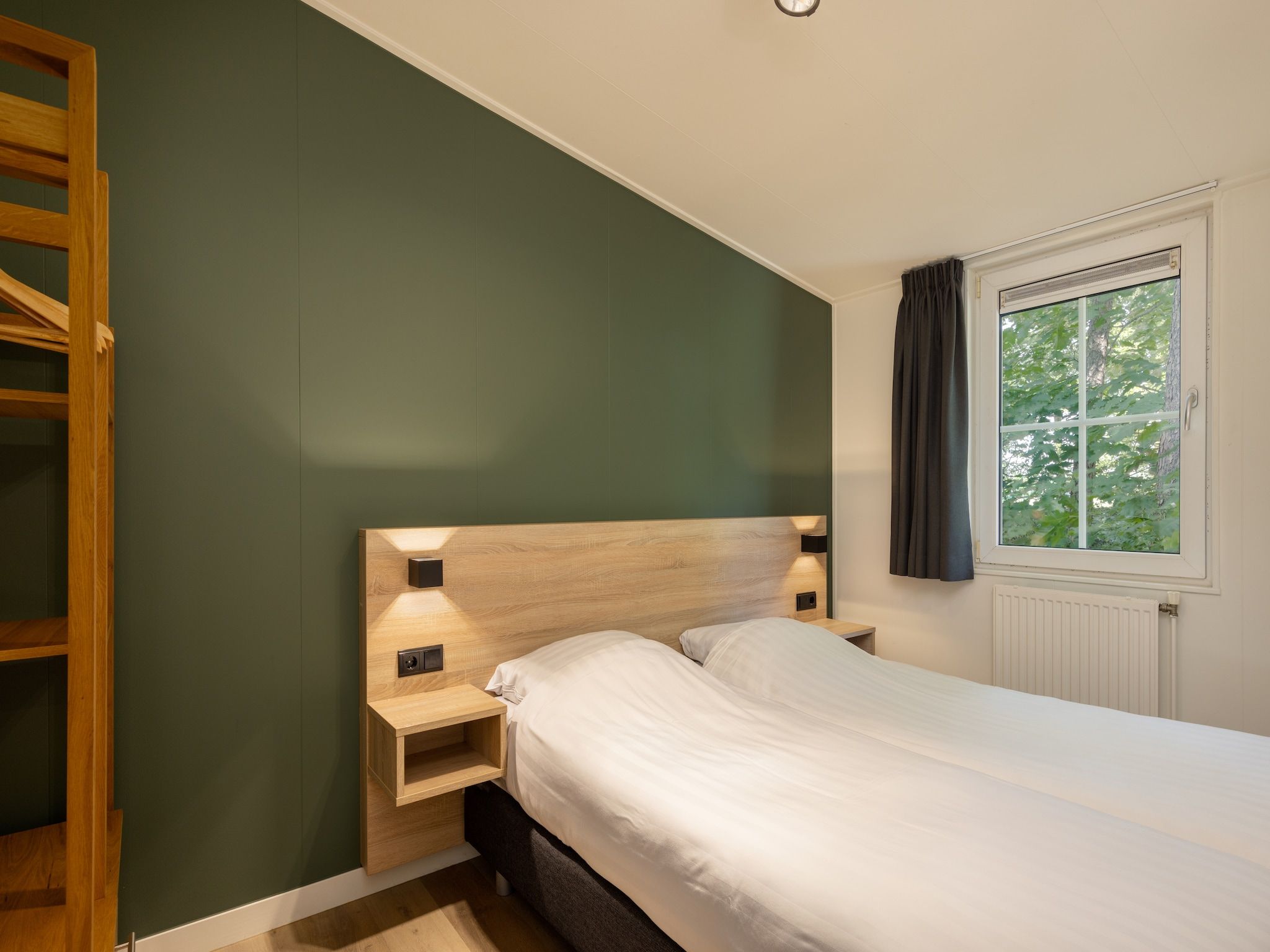 Een slaapkamer van Park De Peel 2 in Vlierden