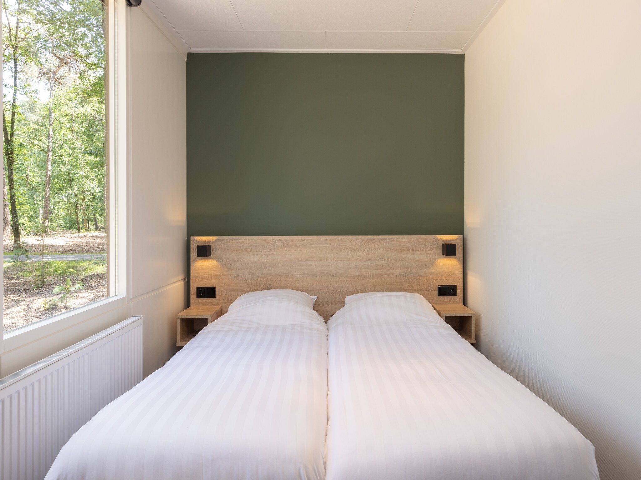 Een slaapkamer van Park De Peel 3 in Vlierden