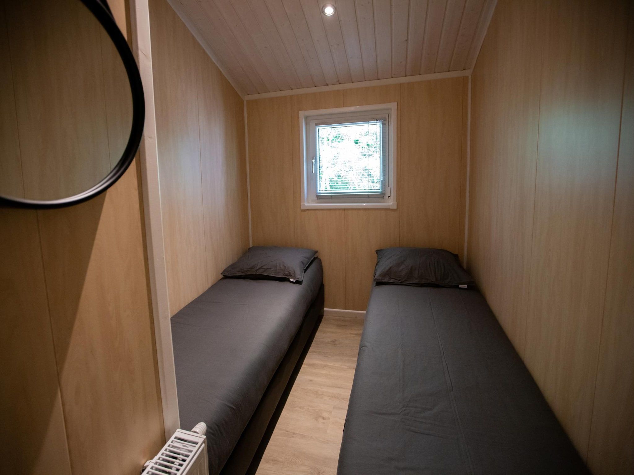 Een slaapkamer van Vakantiepark Latour 3 in Oirschot