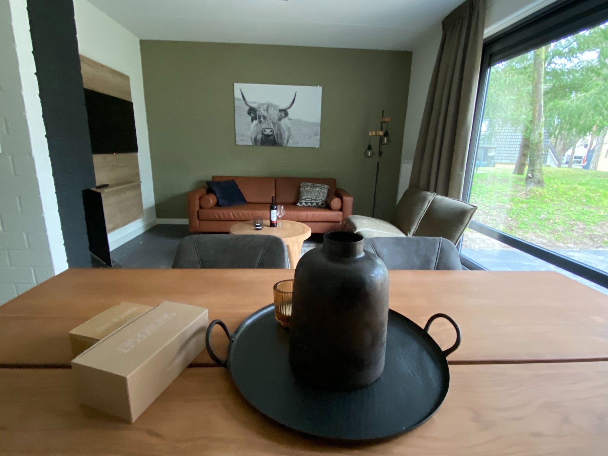 De woonkamer van Vakantiepark de Katjeskelder 20 in Oosterhout