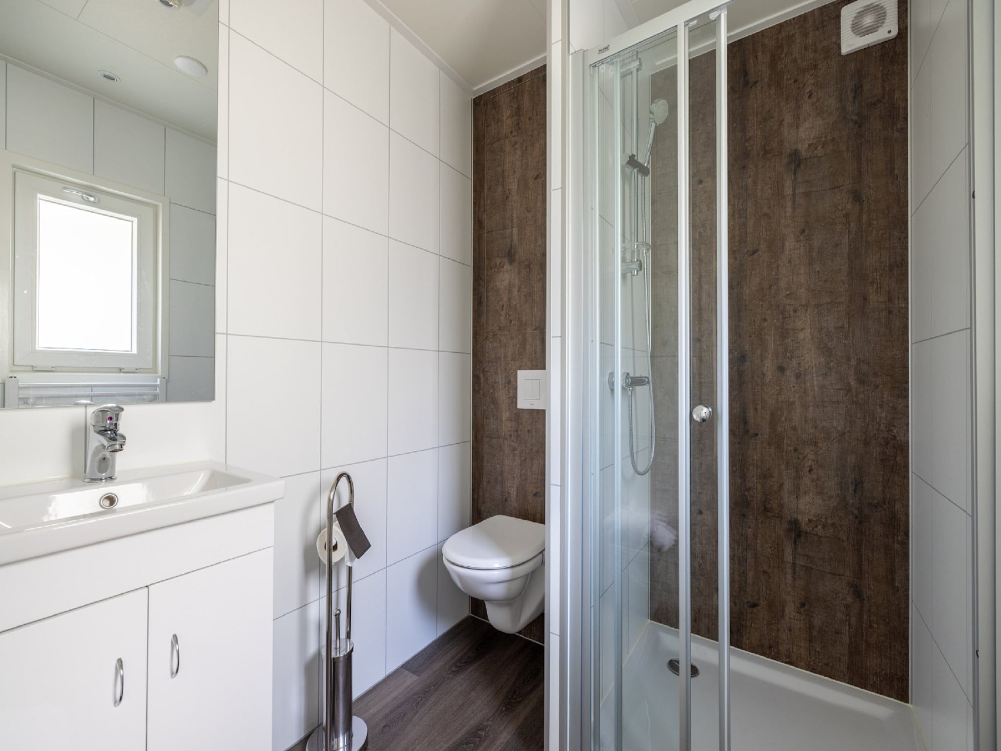 De badkamer van Vakantiepark De Rimboe & De Woeste Hoogte 21 in Hoenderloo