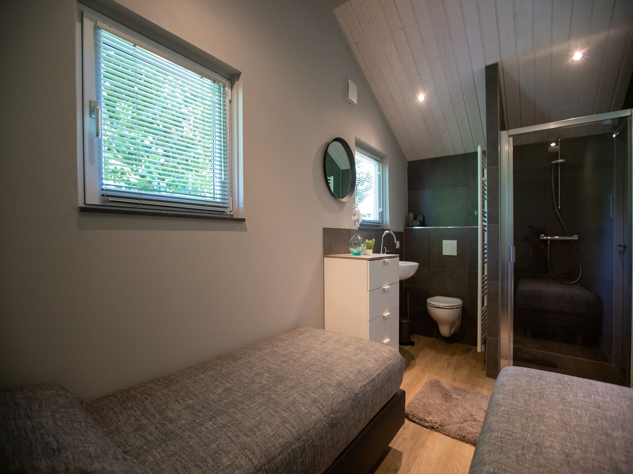 Een slaapkamer van Vakantiepark Latour 1 in Oirschot