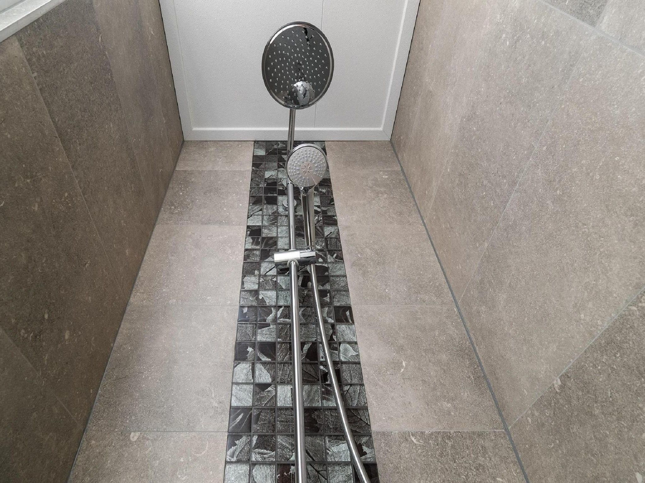 De badkamer van Vakantiepark De Rimboe & De Woeste Hoogte 24 in Hoenderloo