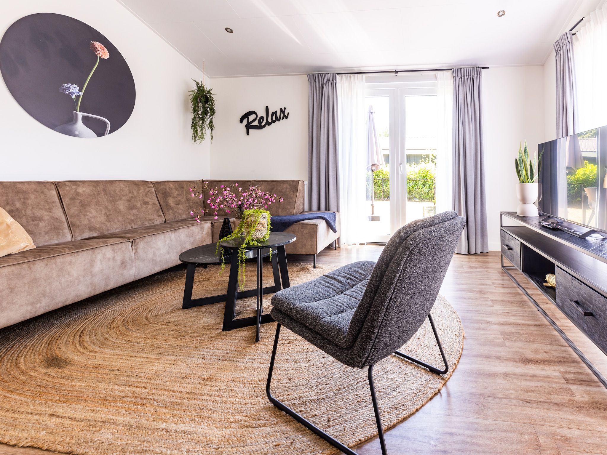 De woonkamer van Vakantiepark Molenvelden 1 in Veldhoven