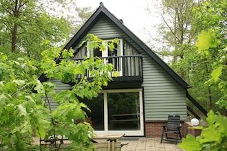 Bosschuilplaats met open haard in Herpen