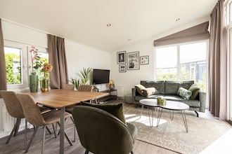 Chalet in Gelderland met ruime tuin in Lathum