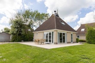 Gezellige bungalow met terras in Eernewoud