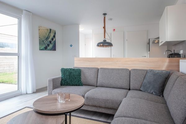 Woonkamer - Lodge in Nieuwvliet Bad bij het Strand in Nieuwvliet-Bad (2)
