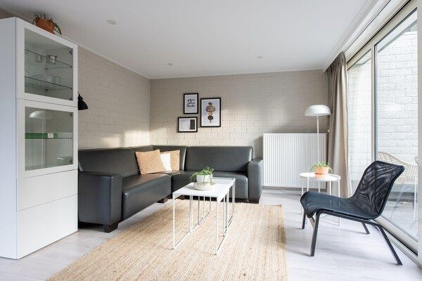 Woonkamer - Bungalow bij Veluwezand in Kootwijk (5)