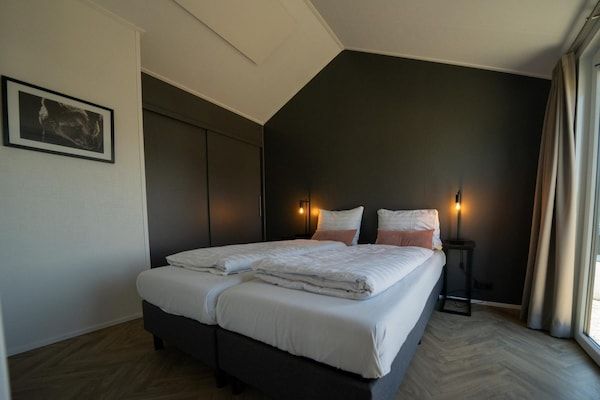 Slaapkamer - Modern chalet met afwasmachine, op5 km van Kampen in Kampen (3)
