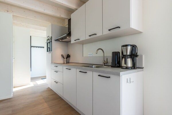 Keuken - Duinlodge op vakantiepark, strand op 1,3 km in Cadzand (3)