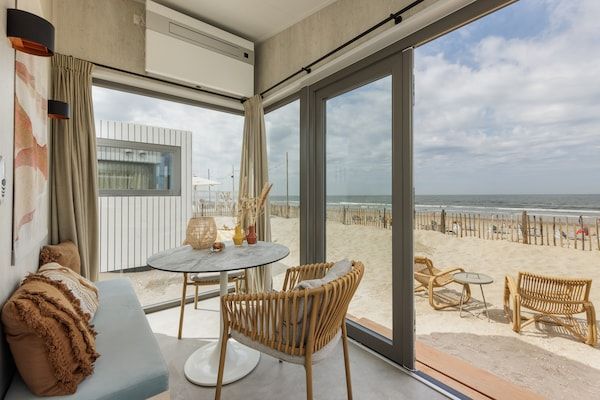 Woonkamer - Strandhuis in Zandvoort met Uitzicht in Zandvoort (2)